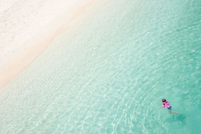 High angle view of woman in swimming pool