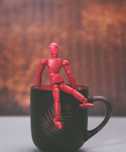 Close-up of figurine on table