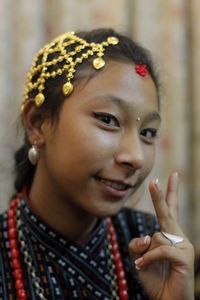 Close-up portrait of a smiling young girl