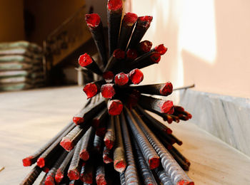 Close-up of red decoration on table at home