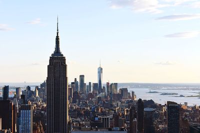 Modern buildings in city against sky