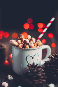 Close-up of coffee cup on table