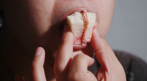 Close-up of woman holding fruit