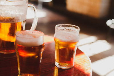 Close-up of beer in glass on table