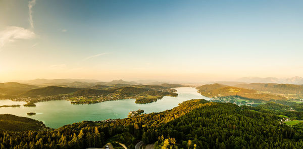 Scenic view of lake against sky during sunset