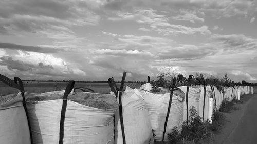 Clothes drying on clothesline against sky