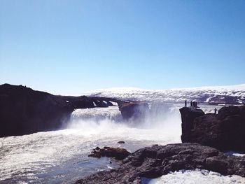Scenic view of sea against clear sky