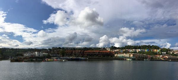 Panoramic shot of river and buildings in town