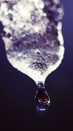 Close-up of glass over white background