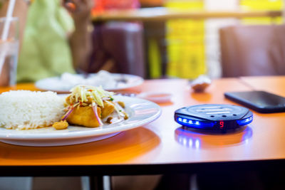 Close-up of food served on table