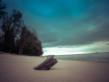 Scenic view of road against cloudy sky