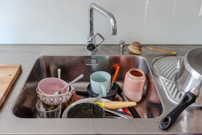 High angle view of kitchen utensils on table