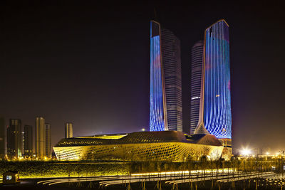 Scenic view of illuminated building at night