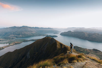 Man on mountain against sky