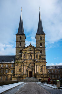 Michaelsberg abbey against cloudy sky during winter