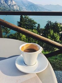 Close-up of coffee cup on table