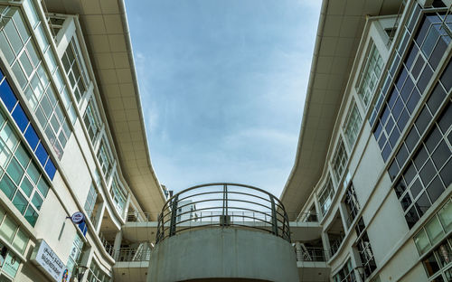 Low angle view of modern building against sky