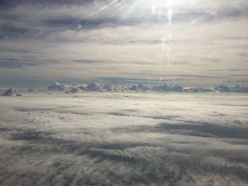 Aerial view of cloudscape over landscape