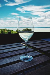 Close-up of wine in glass on table