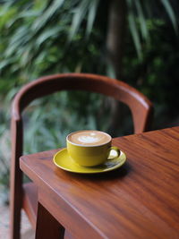 Close-up of tea cup on table