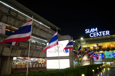 Information sign in illuminated city at night