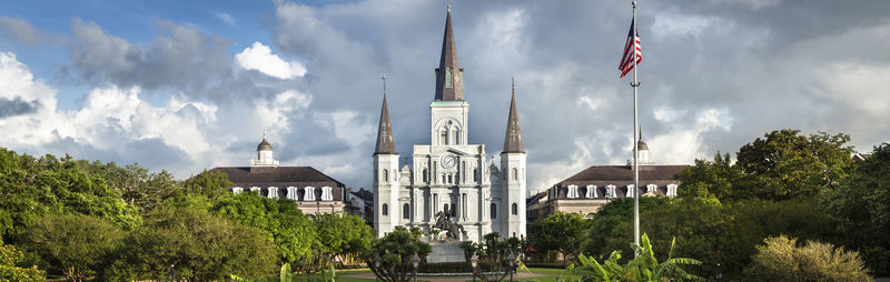 Panoramic view of buildings in city against sky