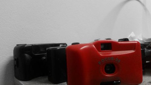 Close-up of red camera