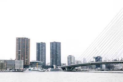 Modern cityscape against clear sky