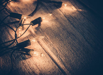 High angle view of illuminated lights on table