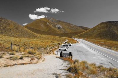 Road amidst landscape against sky