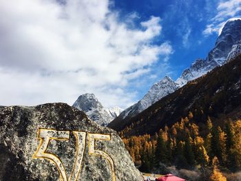 Scenic view of snowcapped mountains against sky