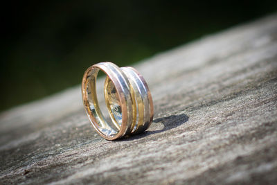 Close-up of ring on wooden table