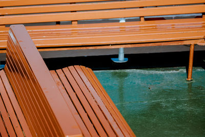 High angle view of empty seats on boat deck