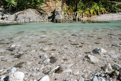 Boulders and rocks on the riverbed of the torre river. friuli to discover