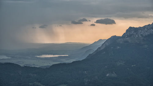 Scenic view of mountains against sky during sunset