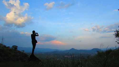 Scenic view of mountains against sky during sunset