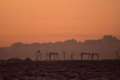 Scenic view of silhouette pier against sky during sunset