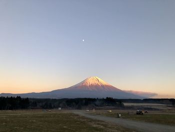 Scenic view of landscape against sky during sunset