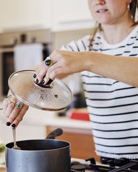 Young woman preparing food