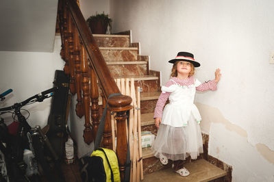 Full length of woman standing on ground