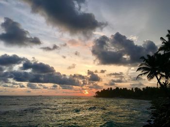 Scenic view of sea against dramatic sky