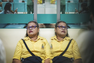 Multiple image of senior woman in waiting room