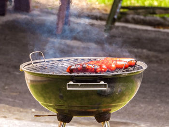 Close-up of meat on barbecue grill