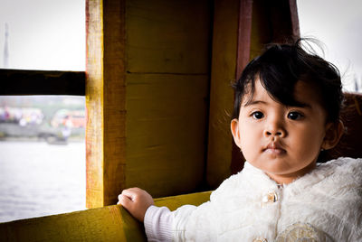 Portrait of cute girl looking away