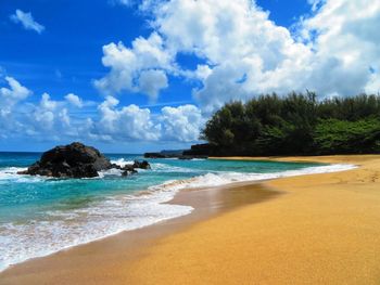 Scenic view of beach against sky