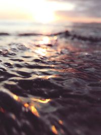 Close-up of rippled water at sunset