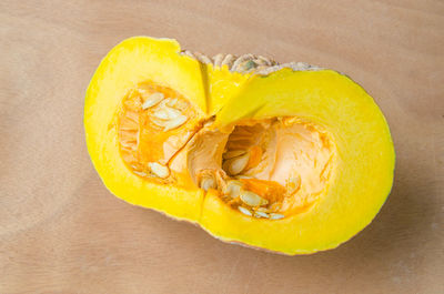 Close-up of lemon slice on table