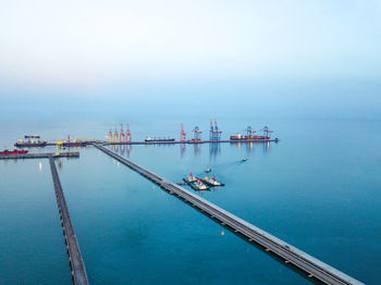 High angle view of pier over sea against sky