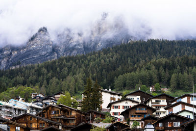 High angle view of trees and houses against sky
