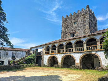 Low angle view of old ruins against sky